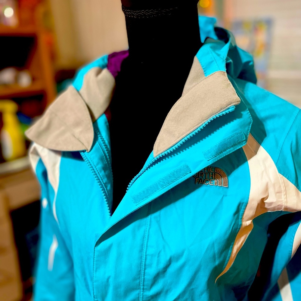Blue north face rain jacket